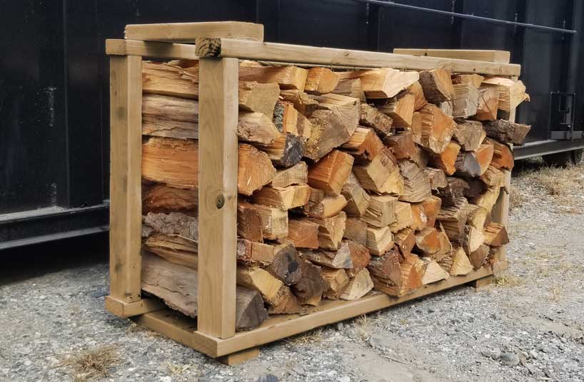 Seasoned firewood bundles and face cords for heating, fireplaces, and campfires in North Georgia
